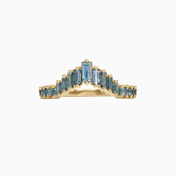 Contoured wedding band with teal sapphires