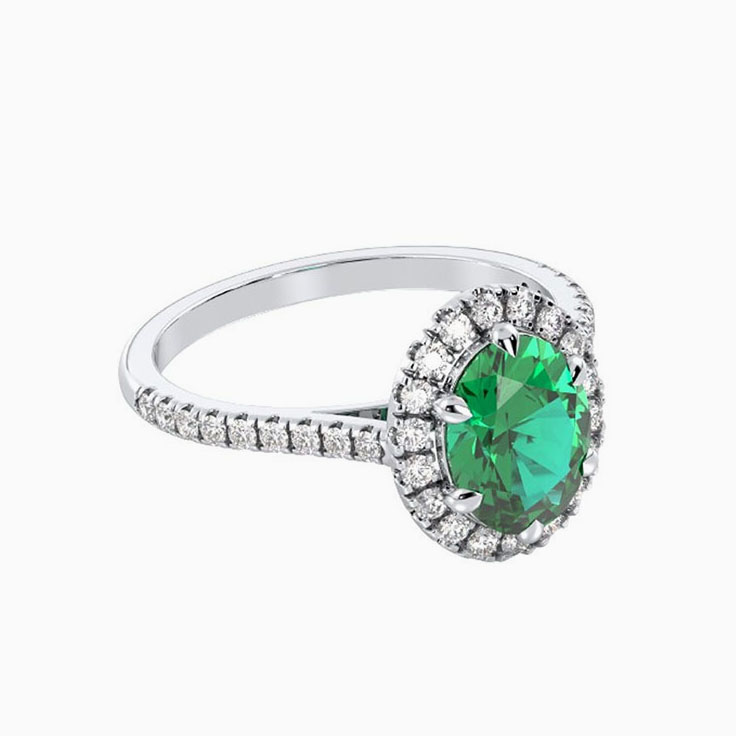 Oval emerald and diamond ring