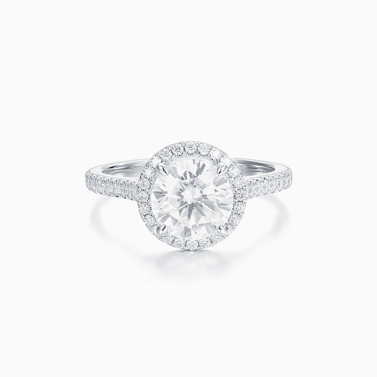 Classic Round Brilliant Engagment ring with a Diamond Halo