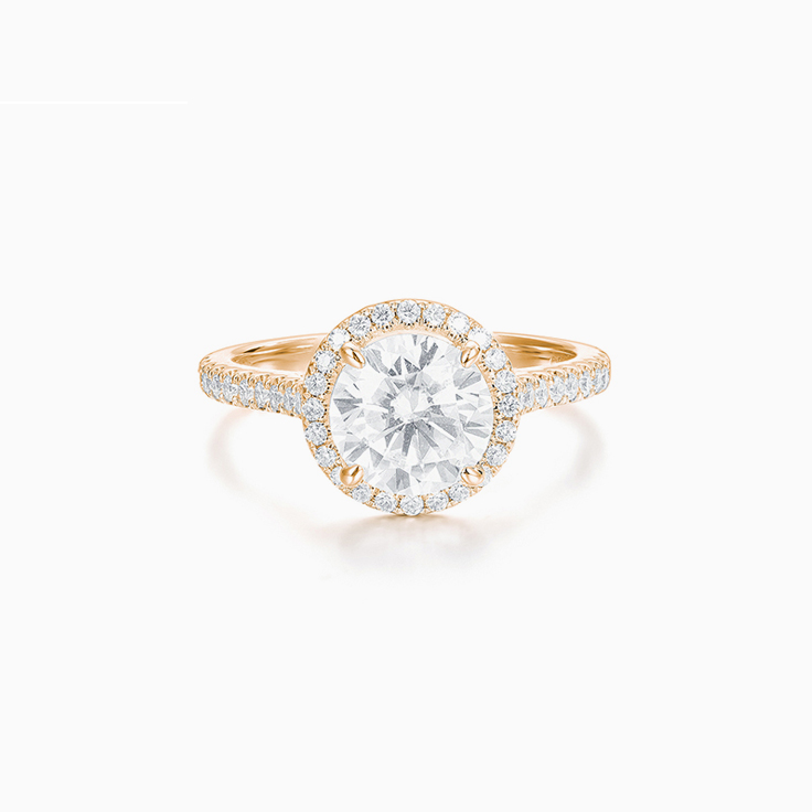 Classic Round Brilliant Engagment ring with a Diamond Halo
