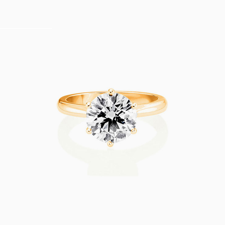 Round Brilliant Cut Engagement Ring In A Six Claw Setting