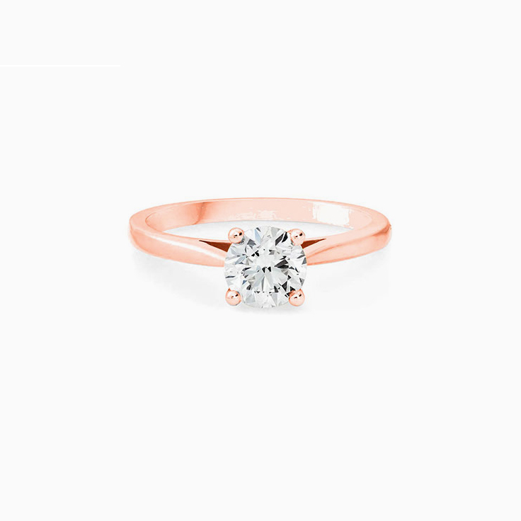 Round brilliant cut engagement ring in a four claw setting