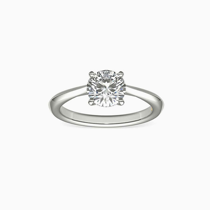 Round brilliant cut diamond on knife edge band enagement ring