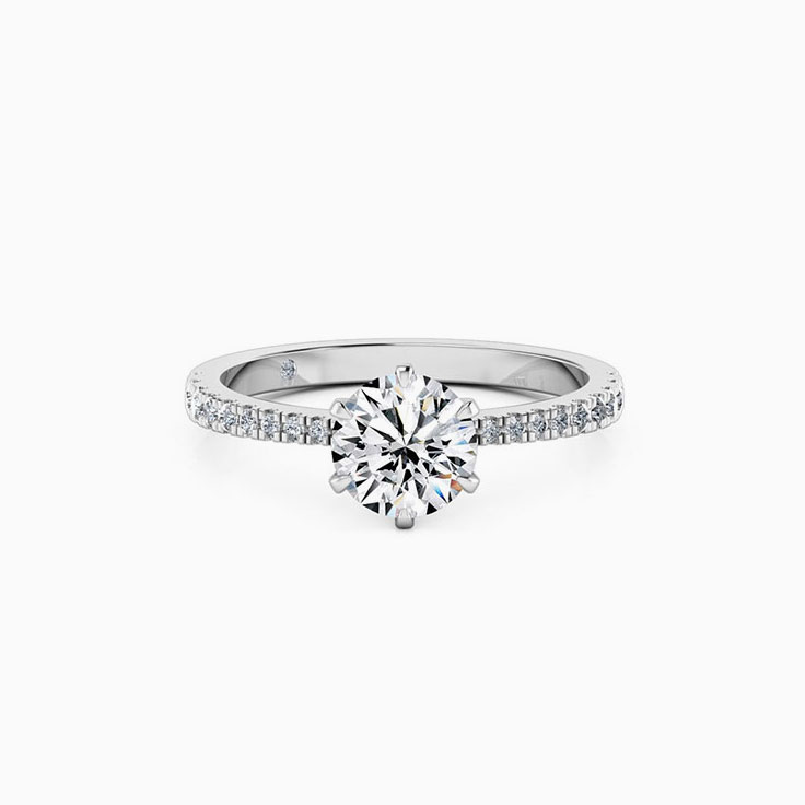 Round Brilliant cut diamond on a tapered diamond band ring