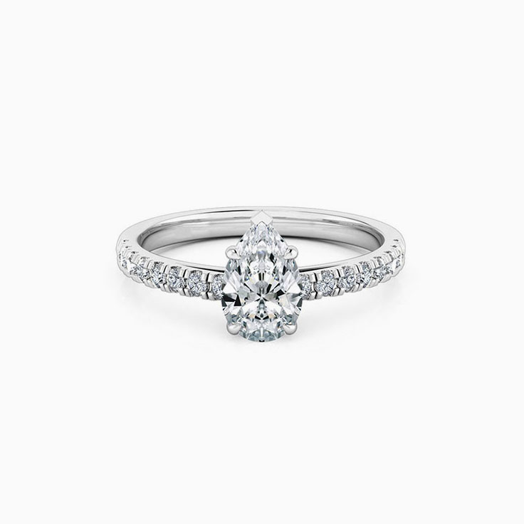 Pear cut diamond engagement ring set on a diamond band