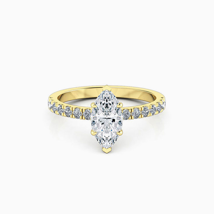Marquise cut diamond engagement ring with diamond band