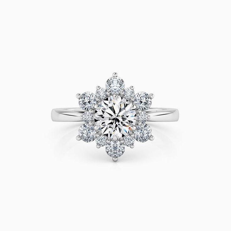Round Brilliant Cut Engagement Ring With a Floral diamond Halo