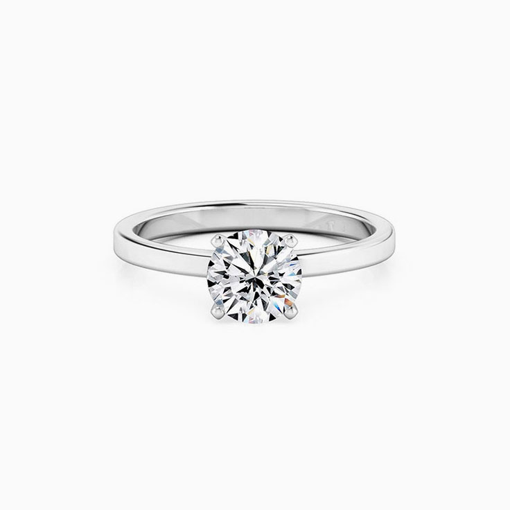 Round Brilliant Cut Engagement Ring With A Flat Plain Band