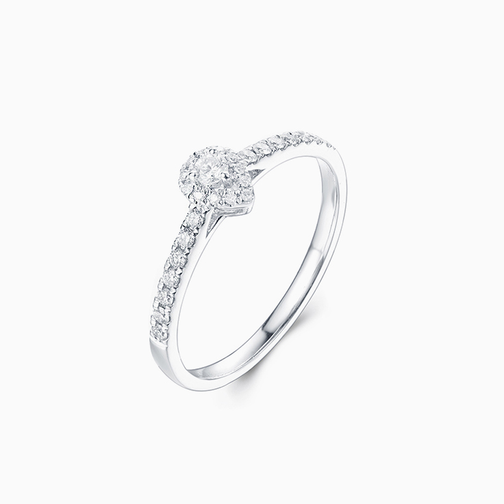 Round diamond with a Pear diamond Halo Engagement ring