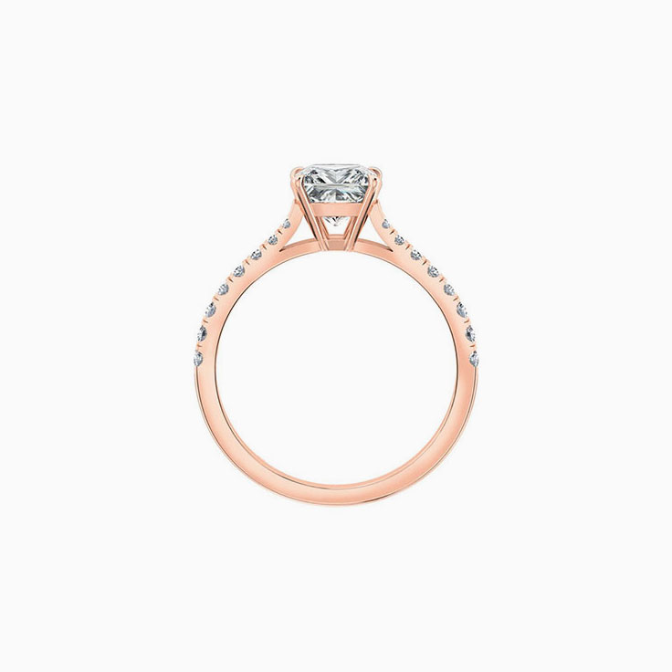 Princess cut diamond in four claw set engagement ring