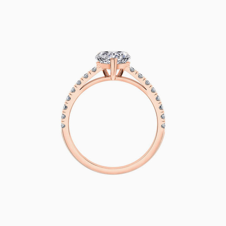 Heart shape diamond engagement ring on a diamond band