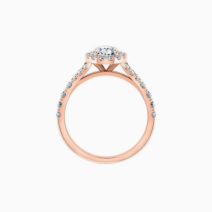 Pear cut daimond with halo and spilt diamond band