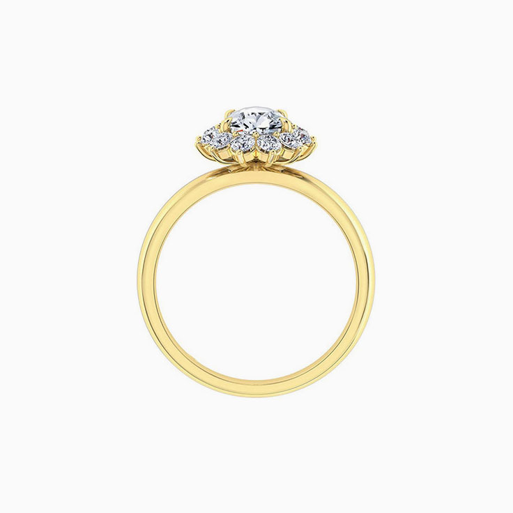 Pear cut diamond engagement ring with a floral diamond halo